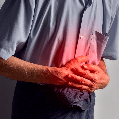 Pessoa com dor abdominal associada à colite